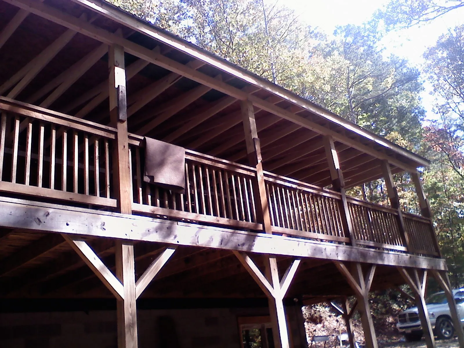 Timber framing under a new elevated porch and deck — Roof Leak Repair in Medina by Roofing Brothers